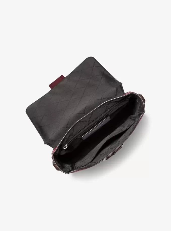 Colby Logo Embossed Burnished Leather Messenger Bag